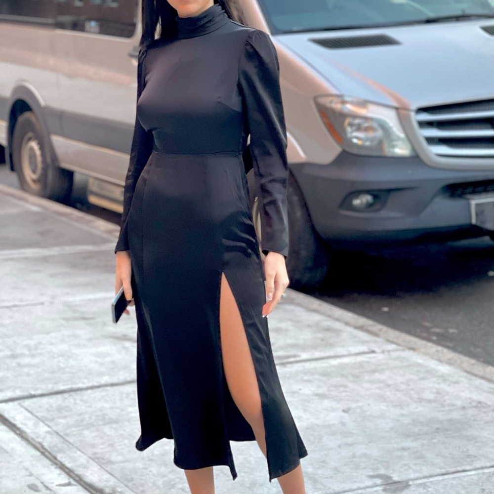 Black turtle neck long sleeve dress.